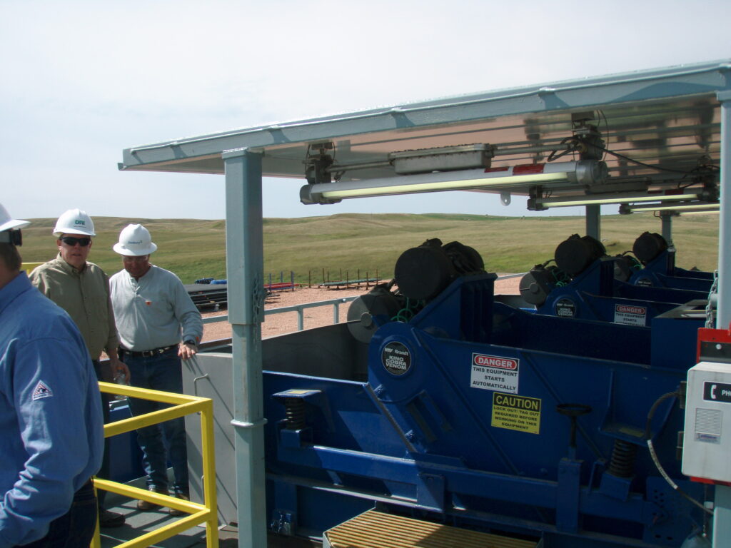 Shale shakers installed in a drilling rig solids control area.